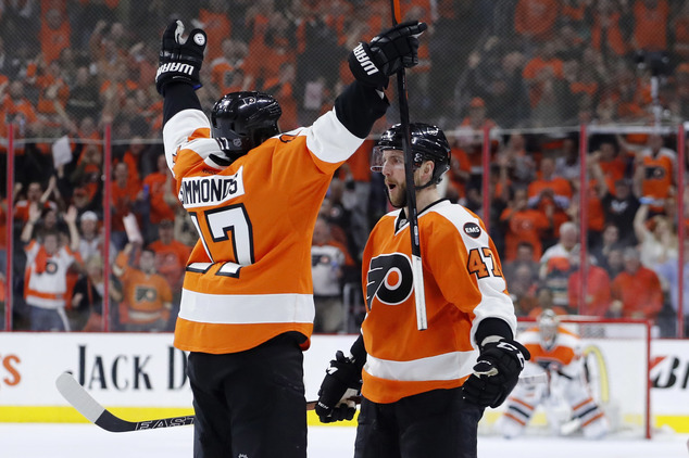 Philadelphia Flyers Wayne Simmonds left and Andrew Mac Donald celebrate after MacDonald's goal during the second period of Game 4 in the first round of the