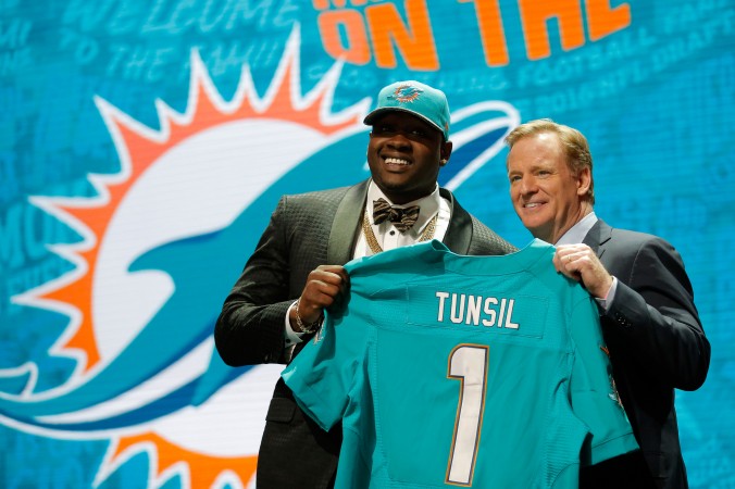 Former Ole Miss tackle Laremy Tunsil was selected by the Miami Dolphins with the 13th pick