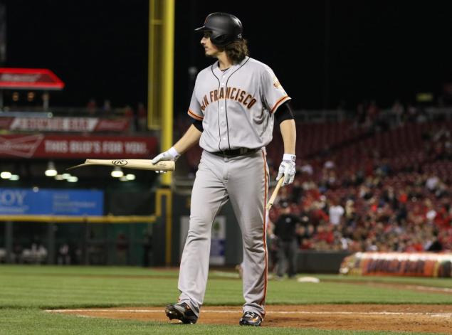 San Francisco Giants starting pitcher Jeff Samardzija tosses his bat after breaking it over his knee