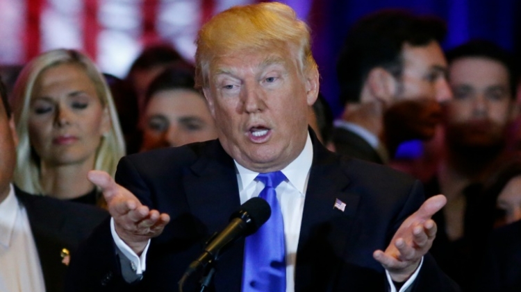 US Republican presidential frontrunner Donald Trump speaks at Trump Tower in New York on April 26,2016 after winning primaries in Pennsylvania Maryland Connecticut Rhode Island and Delaware