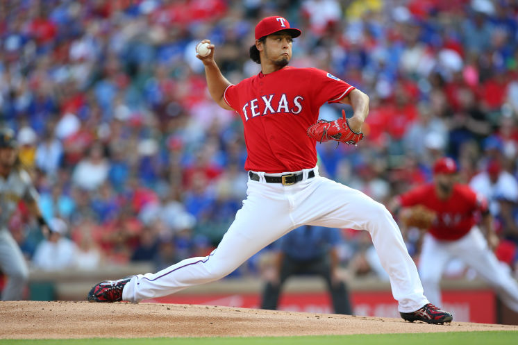 Rangers ace Yu Darvish strikes out seven in five innings and touches 98 mph in his first start since August 2014