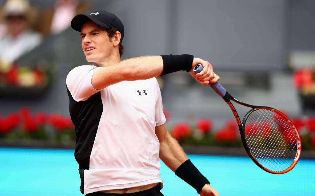 Andy Murray in action against Gilles Simon in their third round match in the Mutua Madrid Open