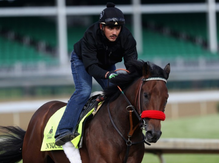 Getty  AFP  File  Rob Carr Exercise rider Jonny Garcia takes Nyquist over the track during training for the Kentucky Derby at Churchill Downs