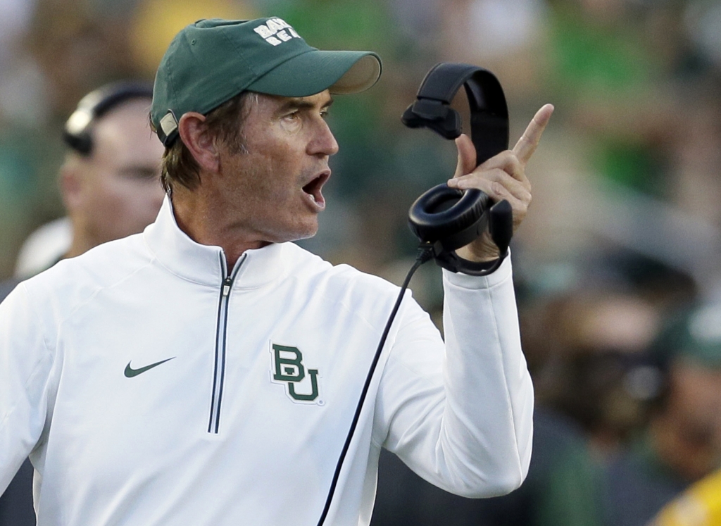 Baylor coach Art Briles yells from the sideline during the first half of an NCAA college football game against Lamar in Waco Texas. Baylor University's board of regents says it will fire Briles and re-assig