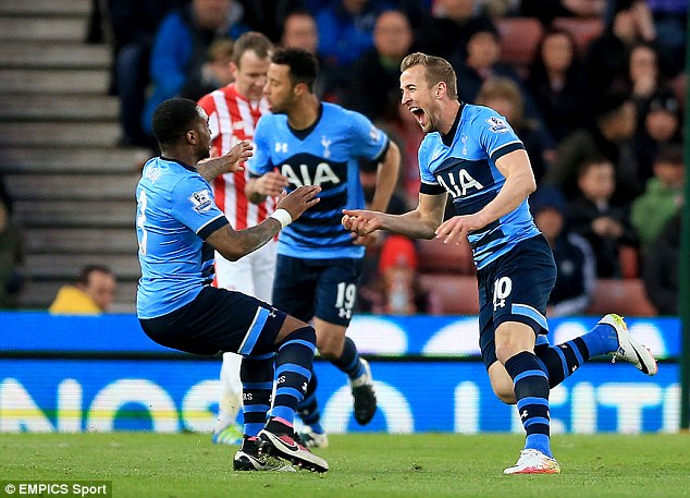 Harry Kane celebrates after putting Tottenham 1-0 up away against Stoke on Monday night