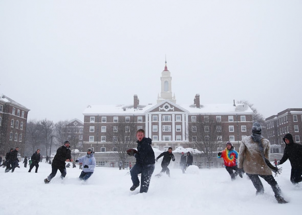 462357818-students-play-football-at-the-quad-on-the-campus-of