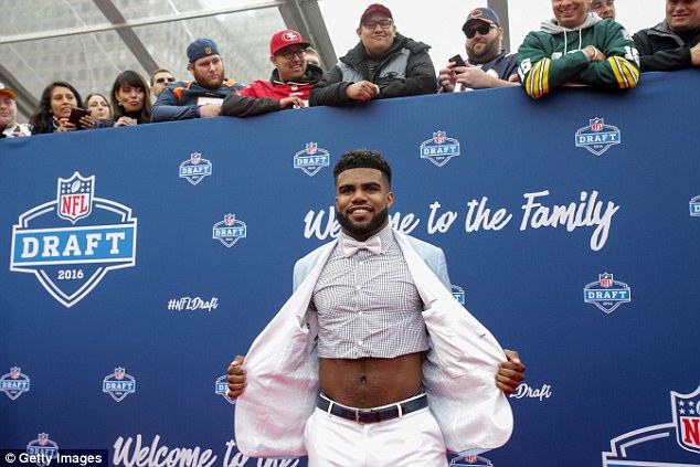 He's got the look Ezekiel Elliott wore a crop-top dress shirt to the NFL Draft on Thursday night