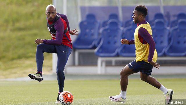 England's Fabian Delph and Raheem Sterling during training