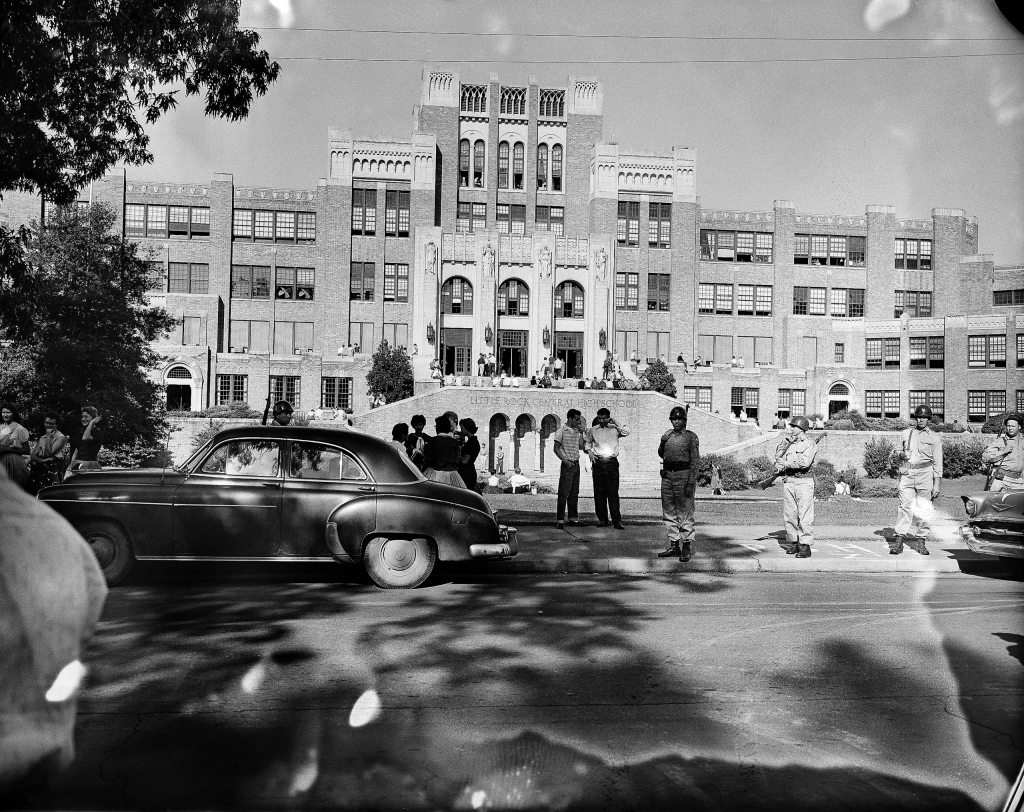 Only a small crowd of people gather in front of Little Rock Central High School the morning of Sept. 16 1957. There were no incidents with no black students trying to enter the school. Gov. Orval Faubus has kept guardsmen around the building for more