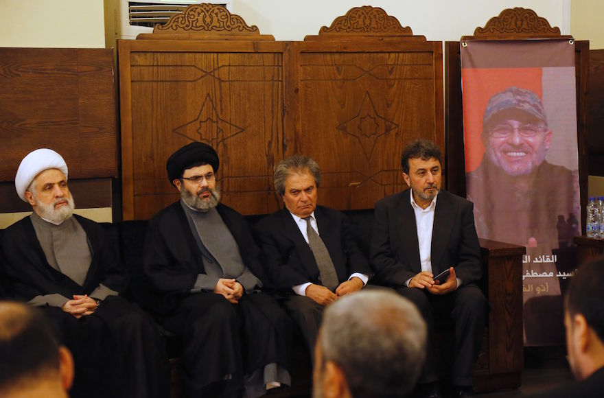 From left to right Lebanese Hezbollah deputy chief Sheikh Naim Qassem head of the Hezbollah Executive Council Sayyed Hashem Safieddine and the brothers Annan Badreddine and Hassan Badreddine of top Hezbollah commander Mustafa Badreddine who was kille