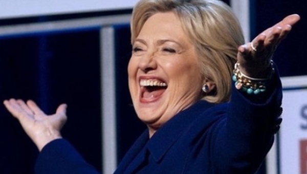 Hillary Clinton walks on stage at a Democratic fundraising dinner in Las Vegas Nevada