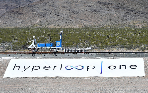 NORTH LAS VEGAS NV- MAY 11 A recovery vehicle moves a test sled down a track after the first test of the propulsion system at the Hyperloop One Test and Safety site