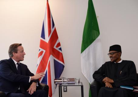 Image Text
 NO APOLOGY NEEDED Prime Minister David Cameron with Nigerian President Muhammadu Buhari in 2015