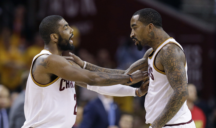 Irving celebrates with J.R. Smith after beating the Atlanta Hawks