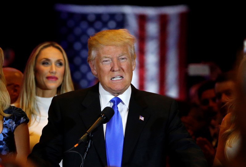 Republican US presidential candidate and businessman Donald Trump speaks to supporters after his rival Senator Ted Cruz dropped out of the race following the results of the Indiana state primary at Trump Tower in Manhattan New York