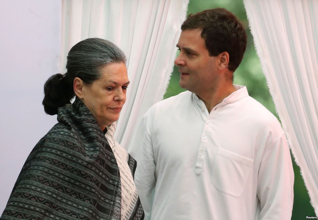 India's main opposition Congress party president Sonia Gandhi and her son and the party's vice-president Rahul Gandhi arrive to address their supporters before what the party calls'Save Democracy march to parliament in New Delhi India May