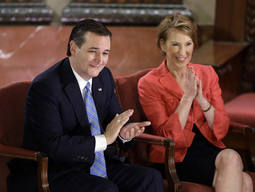 Republican presidential candidate Sen. Ted Cruz R-Texas and vice-presidential candidate Carly Fiorina applaud during a question and answer session with Fox News Channel's Sean Hannity at The Indiana War Memorial Friday