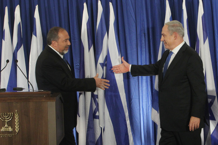 Prime Minister Benjamin Netanyahu and Foreign Minister Avigdor Liberman announce the formation of a united Likud and Yisrael Beytenu list for the upcoming elections October 2012