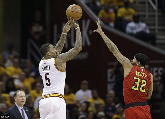 J.R. Smith scored seven 3-pointers as the Cleveland Cavaliers beat the Atlanta Hawks 123-98