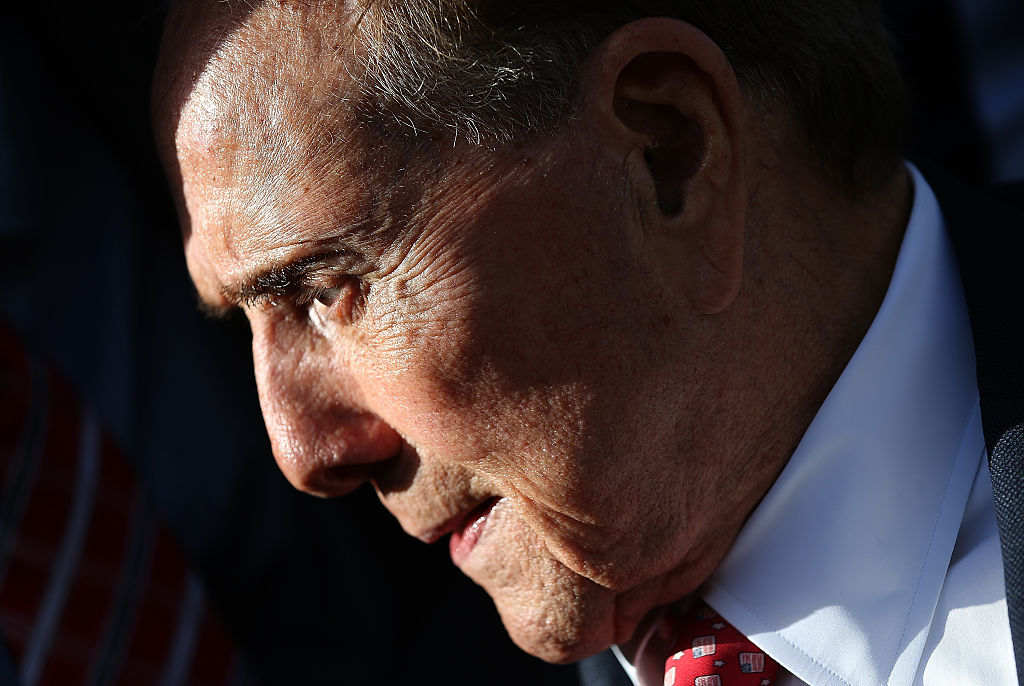 World War II veteran and former Sen. Bob Dole attends a Veterans Day ceremony at the National World War II Memorial