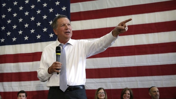 24 2016 shows Republican presidential candidate Ohio Governor John Kasich speaks during a town hall meeting in Rockville Maryland. | AFP