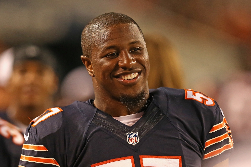 CHICAGO IL- AUGUST 29 Jonathan Bostic #57 of the Chicago Bears watches from the bench during a game against the Cleveland Browns at Soldier Field