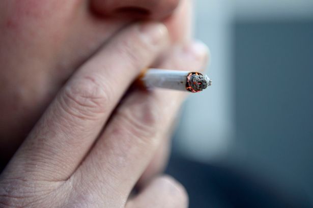 Jonathan Brady  PA Wire

A man smoking a cigarette