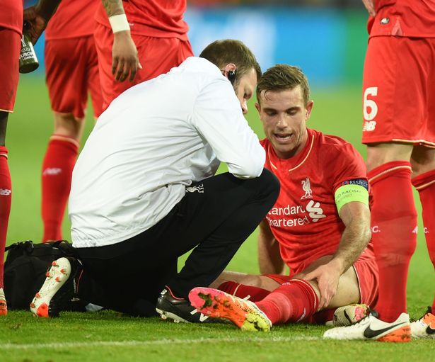 Jordan Henderson receiving treatment against Borussia Dortmund