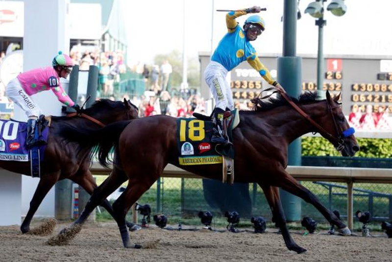 Louisville KY USA Victor Espinoza aboard American Pharoah celebrates winning the 141st Kentucky Derby at Churchill Downs. Mandatory Credit Peter Casey-USA TODAY Sports