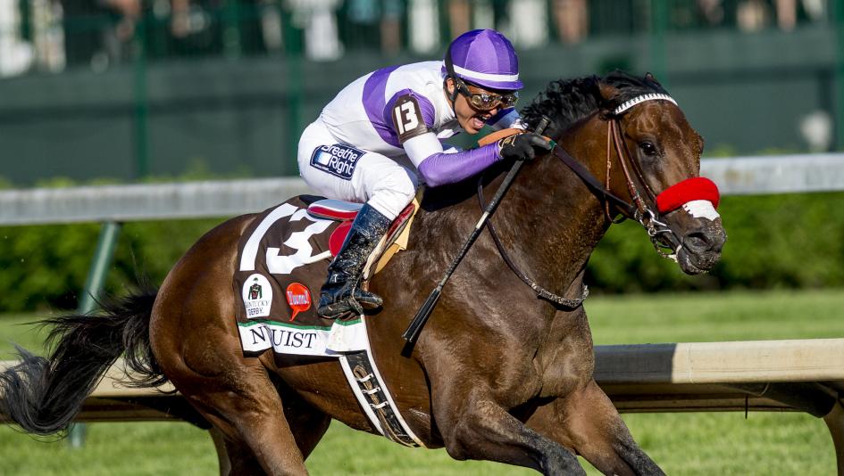 Kentucky Derby winner Nyquist races past Exaggerator toward the finish line Saturday at Churchill Downs