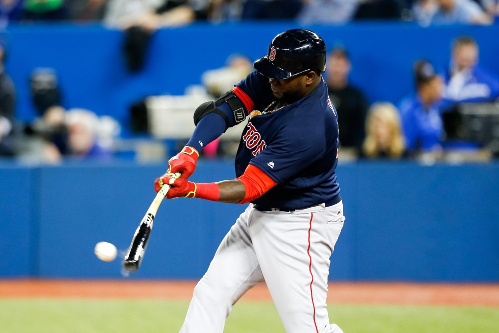 Boston Red Sox Designated hitter David Ortiz  hits a single in the seventh inning against the Toronto Blue Jays at the Rogers Centre in Toronto ON