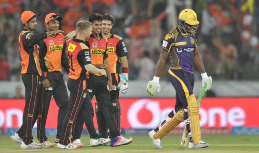 Kolkata Knight Riders cricketer Andre Russell walks to the pavilion after being bowled by Mustafizur Rahman of Sunrisers Hyderabad