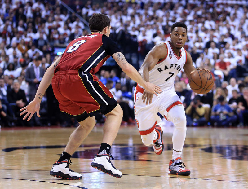 Kyle Lowry driving against Tyler Johnson on Sunday via Getty