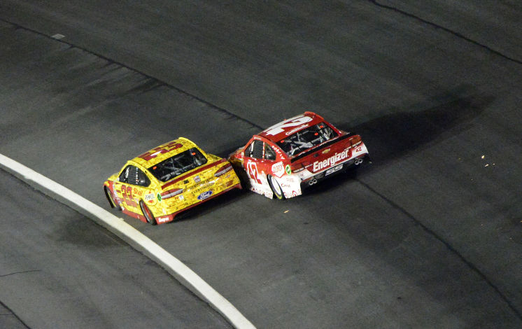 Joey Logano far left gets the inside line on Kyle Larson late in Saturday’s Sprint All Star Race at Charlotte Motor Speedway. Logano led the final two laps to take the victory