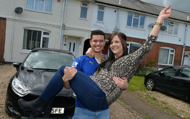 Leicester City fan Levi Taylor and his partner celebrate winning big after betting on the