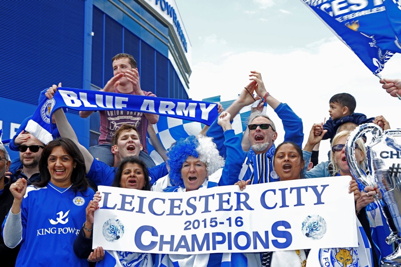 Leicester City fans celebrate outside the stadium. Reuters  Craig Brough