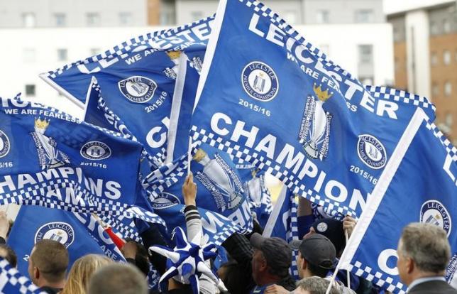 Britain Soccer Football- Leicester City celebrate winning Premier League title- Leicester- 3/5/16 Leicester City fans celebrate with flags Action Images via Reuters  Craig Brough Livepic