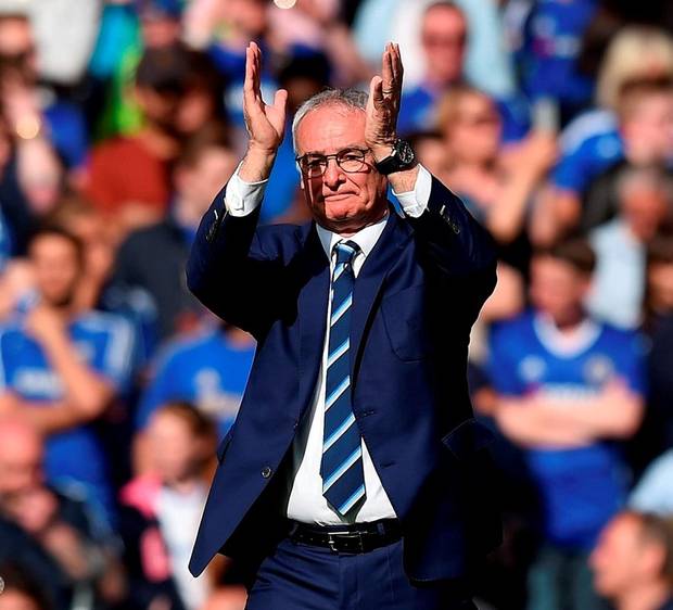 Leicester City manager Claudio Ranieri lifts the Premier League trophy after his side's stellar season