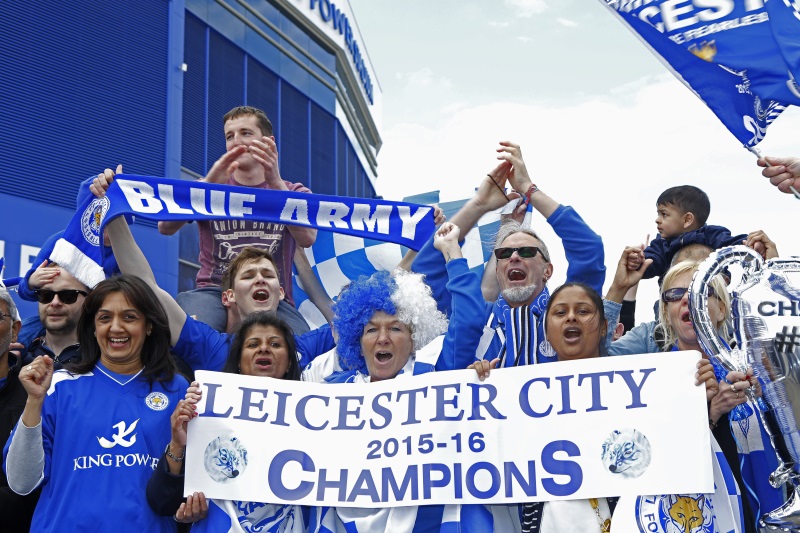 Leicester fans celebrate after winning