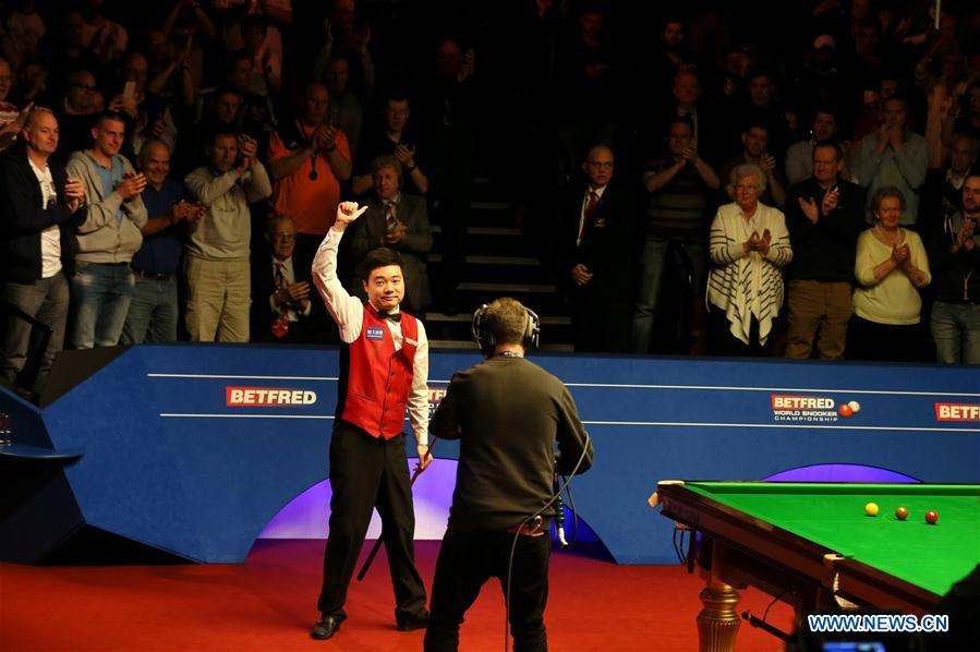 Ding Junhui of China celebrates after the semifinal match against Alan Mc Manus of Scotland at the World Snooker Championship 2016 at the Crucible Theatre in Sheffield England