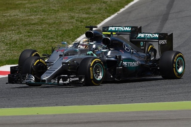 Hamilton and Rosberg crash out of Spanish Grand Prix after first lap collision