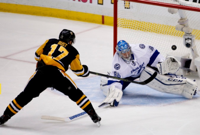 Pittsburgh Penguins Bryan Rust takes a shot against Tampa Bay goalie Andrei Vasilevskiy in the third period of Game 7 of the NHL Eastern Conference finals in Pittsburgh