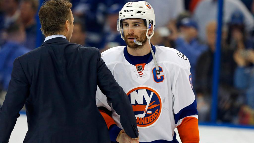 Jason Garrison nets in overtime as Tampa Bay Lightning sink New York Islanders