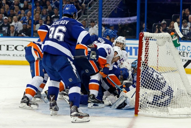 Ben Bishop of the Tampa Bay Lightning makes a save against the New York Islanders during the third period of game five of the Eastern Conference second round