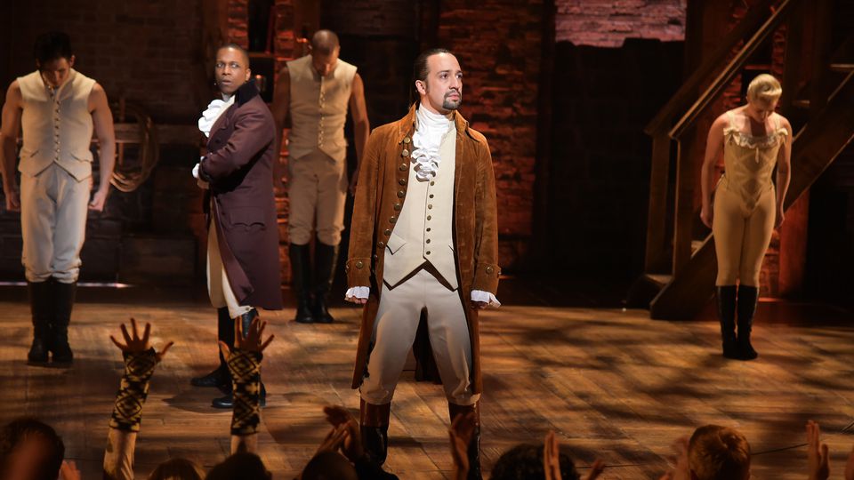 Lin-Manuel Miranda performing at the Grammys with the cast of Hamilton