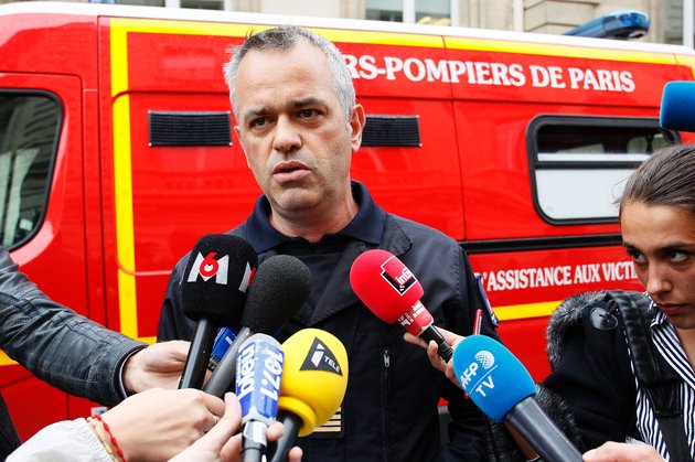 MATTHIEU ALEXANDRE via Getty Images
Fire chief Eric Moulin speaks to journalists near the scene