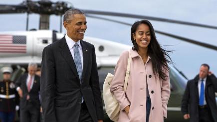 US president Barack Obama with his elder daughter Malia