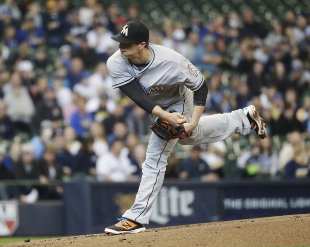 Miami Marlins starting pitcher Tom Koehler throws during the first inning of a baseball game against the Milwaukee Brewers Sunday