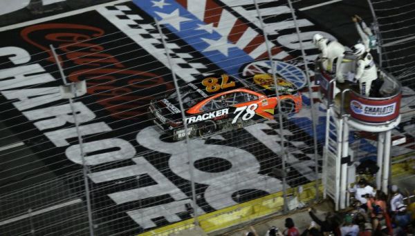 Martin Truex Jr. crosses the finish line