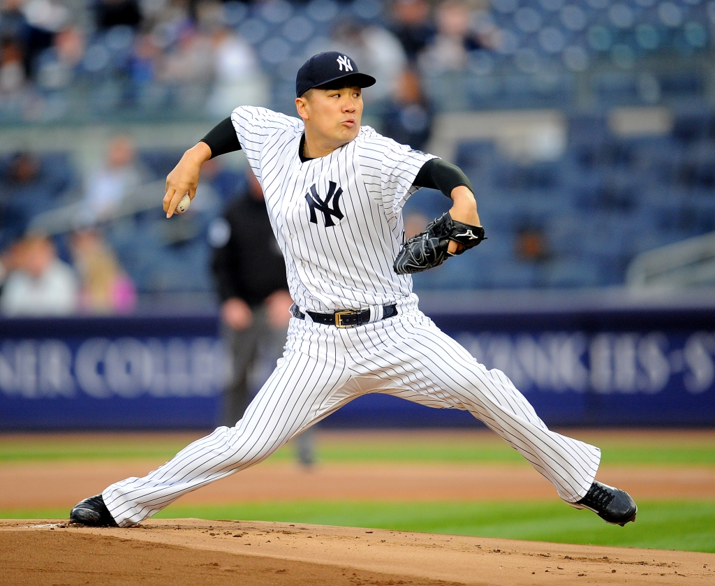 Yankee Stadium Bronx N.Y. New York Yankees lead 1-0 after 1 innning New York Yankees starting pitcher Masahiro Tanaka #19 pitches in the 1st innning